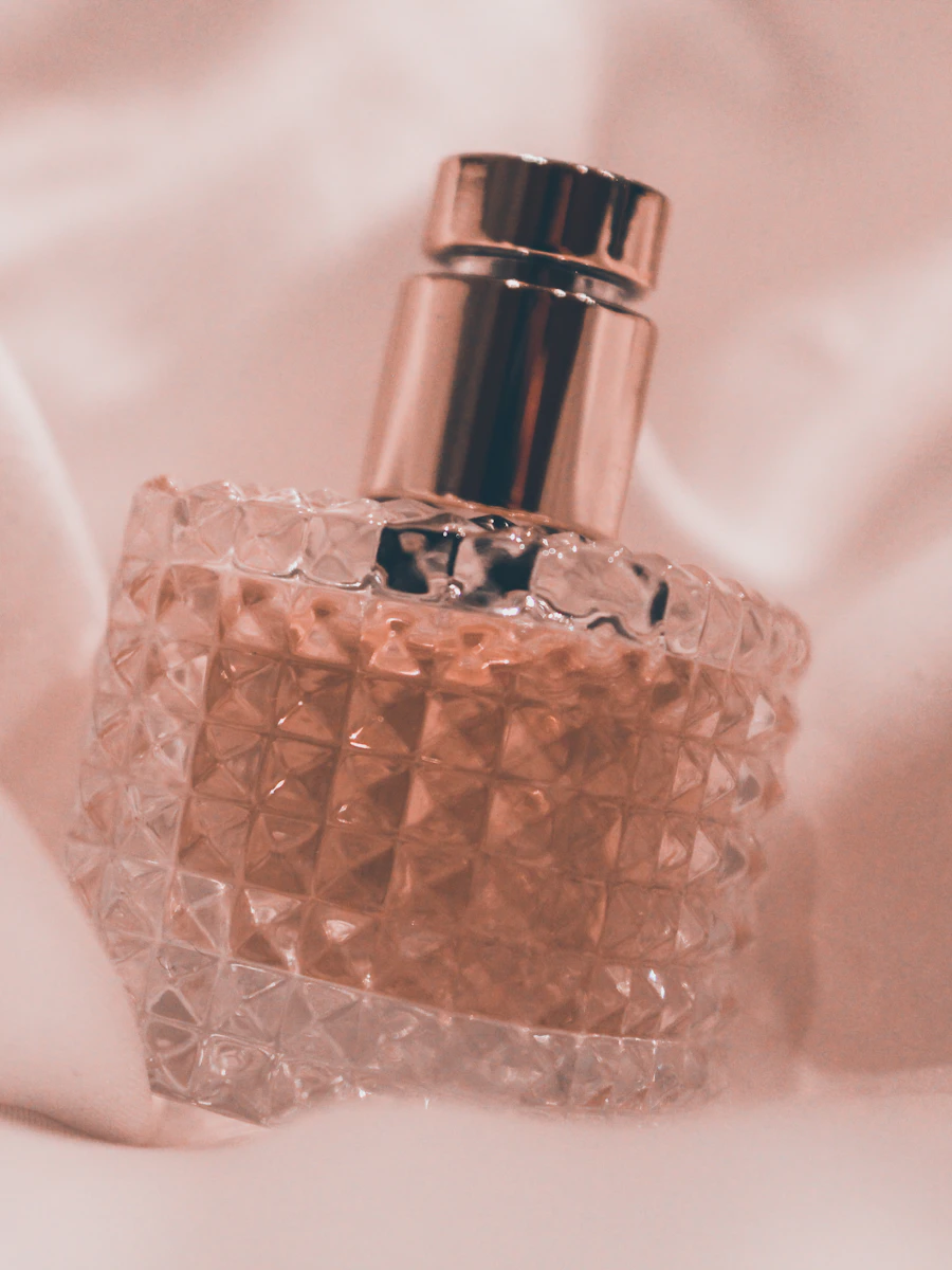 Fragrance presentation mood — perfume bottle detail